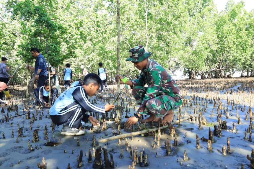 Lestarikan Pantai, Satgas TMMD Kodim 1505/Tidore Galakkan Penanaman Mangrove di Oba Selatan 1 IMG 20251019 WA0035